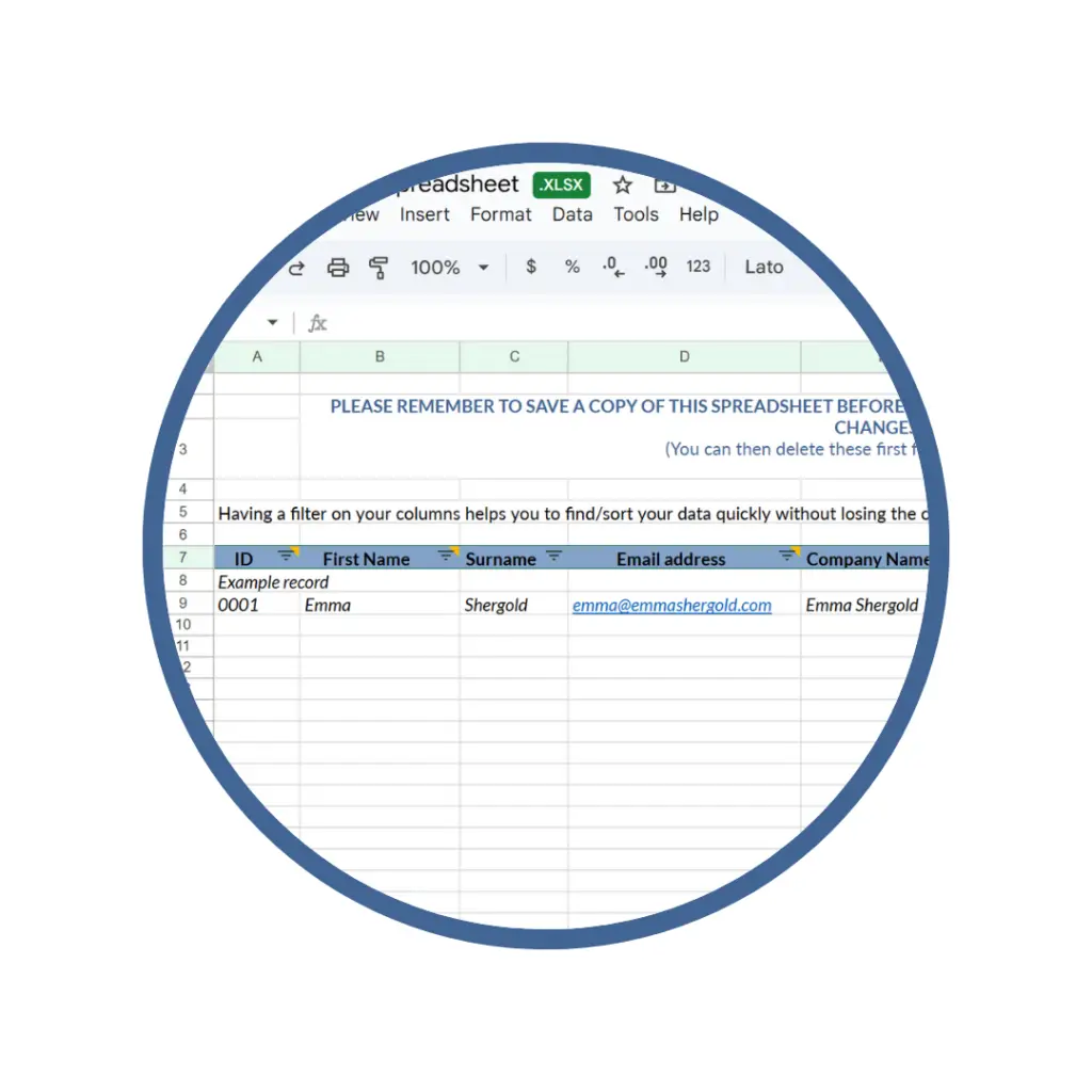 Screenshot of a CRM spreadsheet template shown within a circular frame. The sheet includes example data with column headers for ID, first name, surname, email address, and company name. The example entry lists “0001,” “Emma,” “Shergold,” “emma@emmashergold.com ,” and “Emma Shergold.